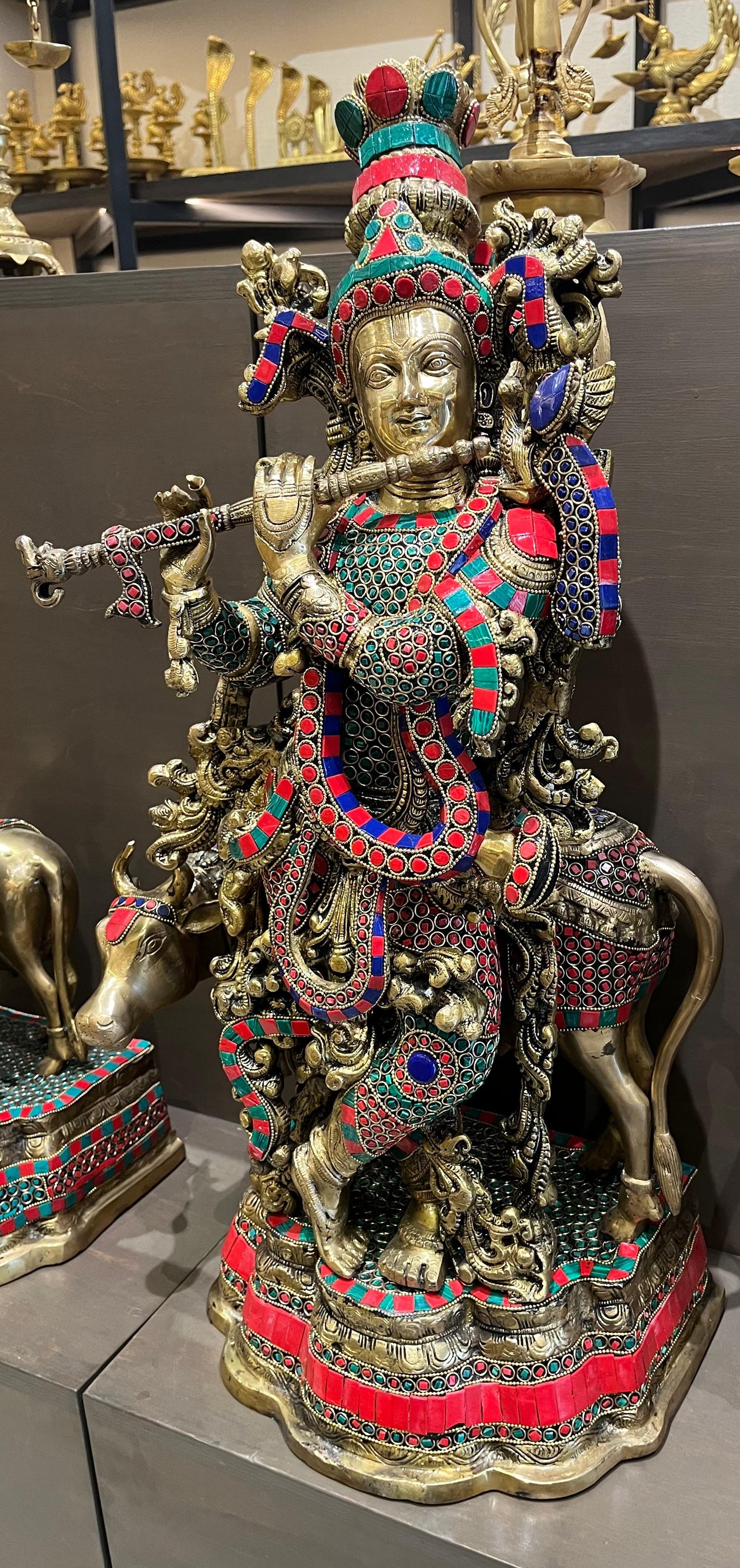 Brass Cow Krishna with Intricate Stonework